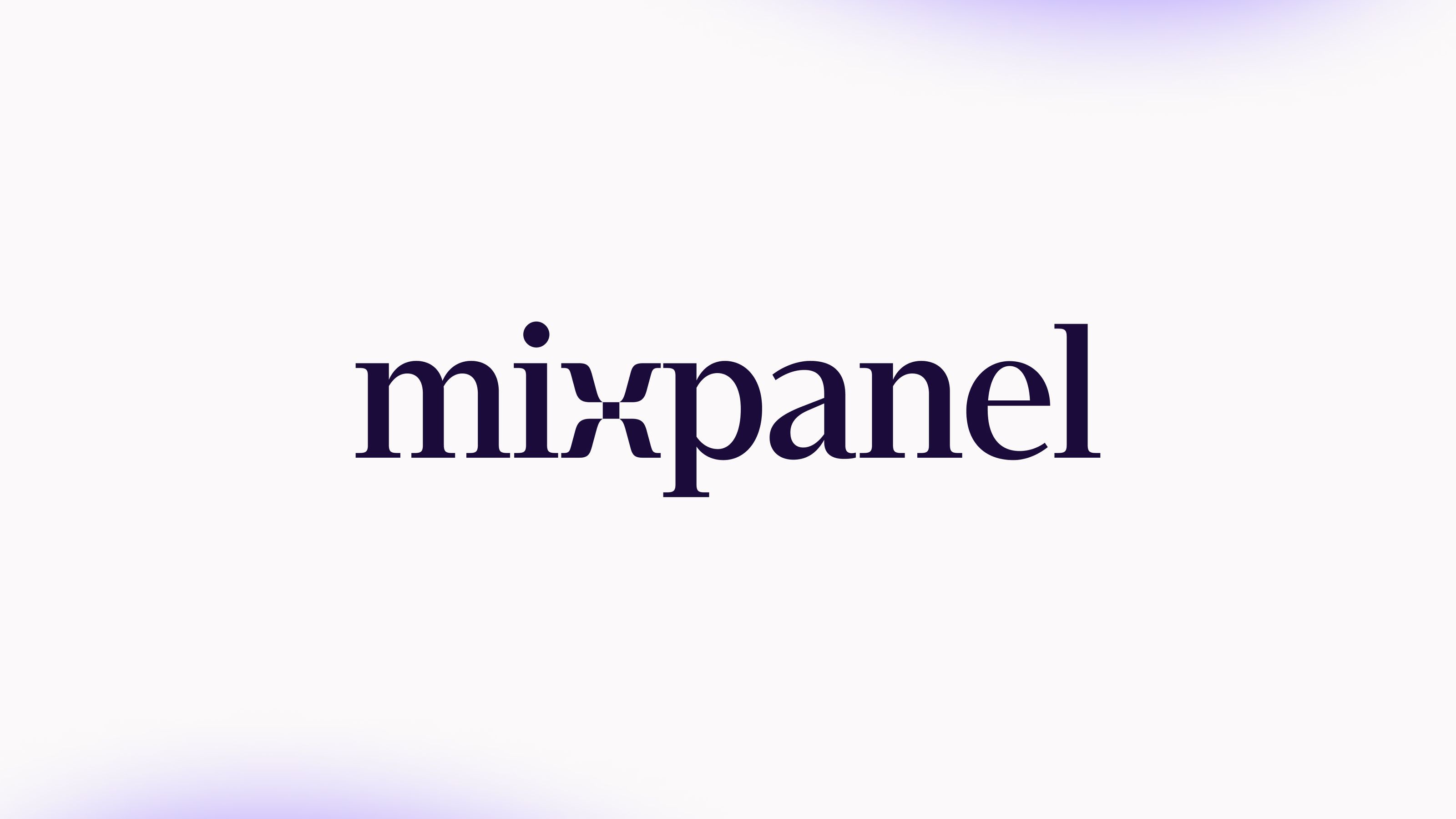 Opening image with the new serif Mixpanel logo front and center in dark purple on a white background with a soft gradient