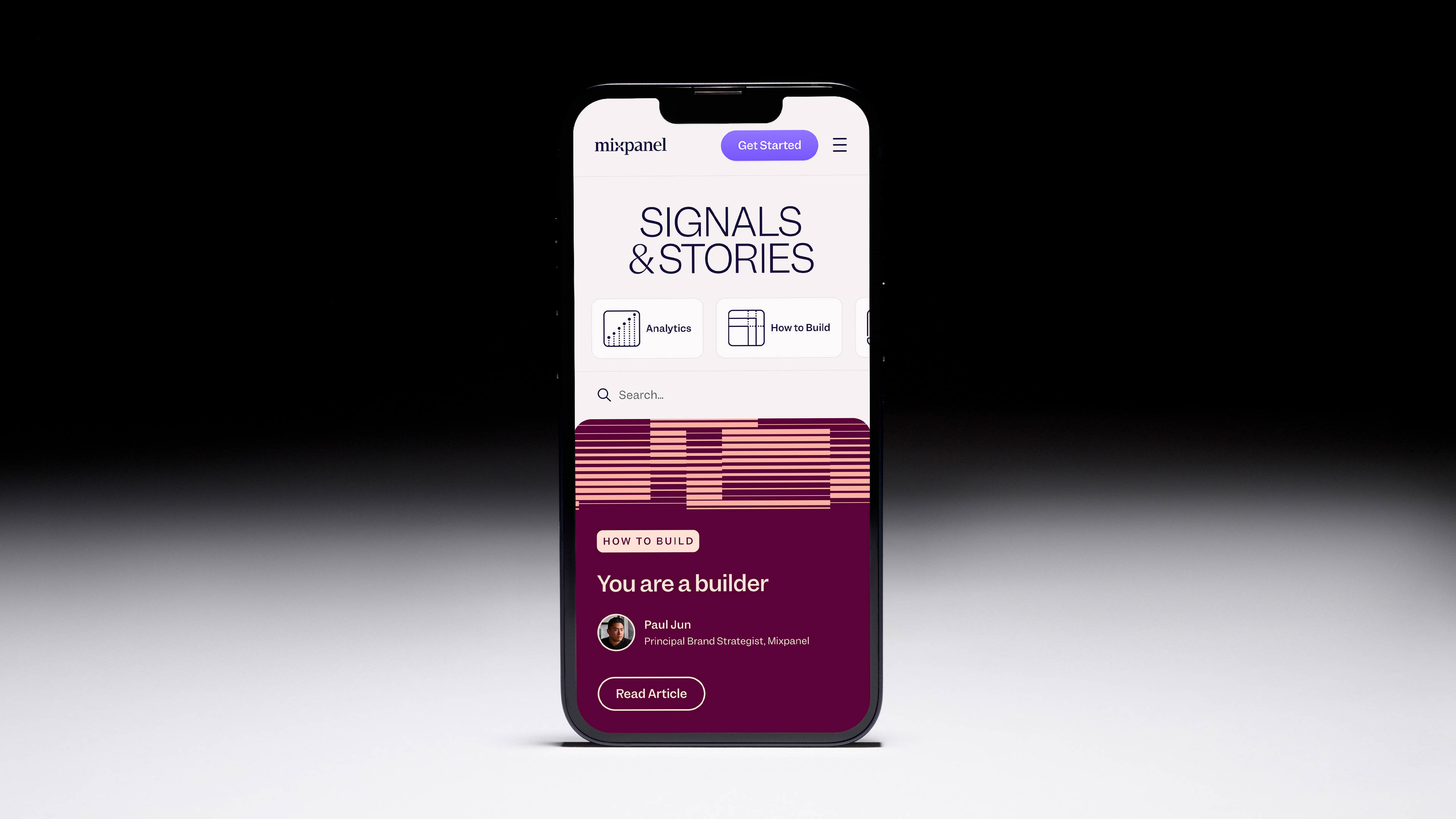 Preview of Signals & Stories blog homepage mocked up on a phone